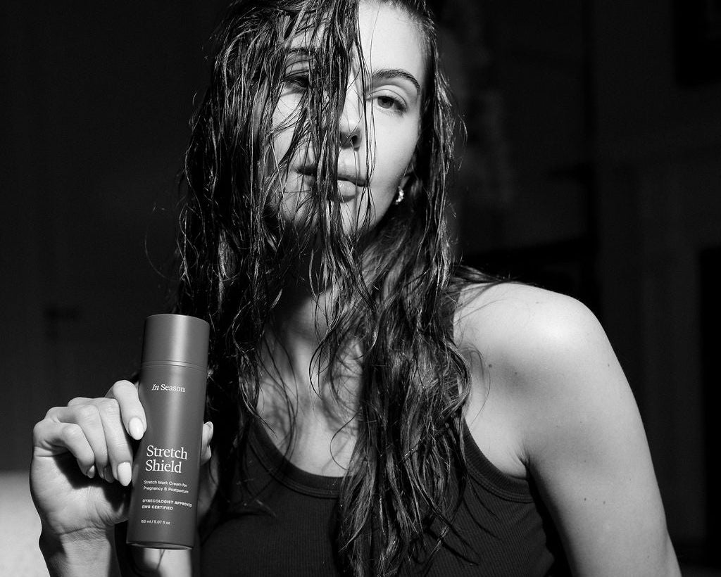 Women holding In Season Stretch Shield 